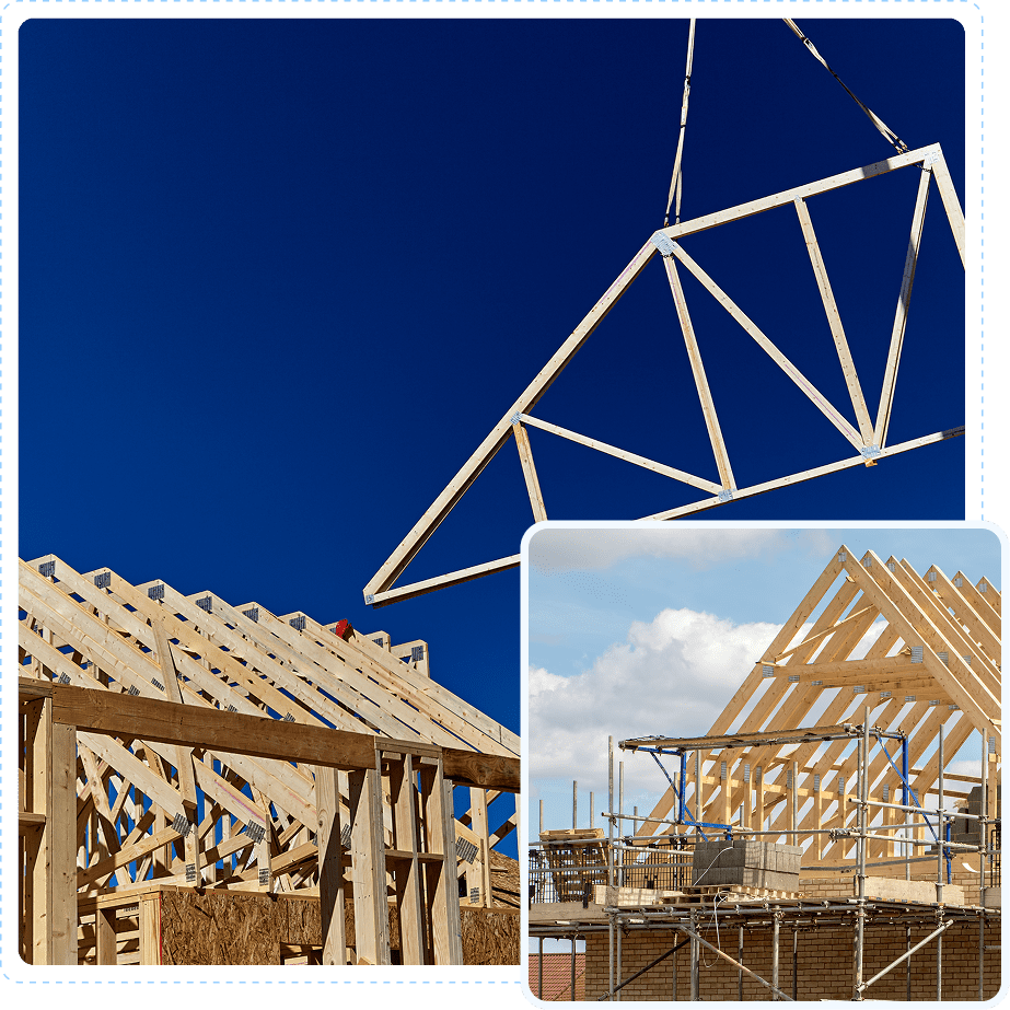 Construction of wooden roof trusses on residential buildings under a clear blue sky.